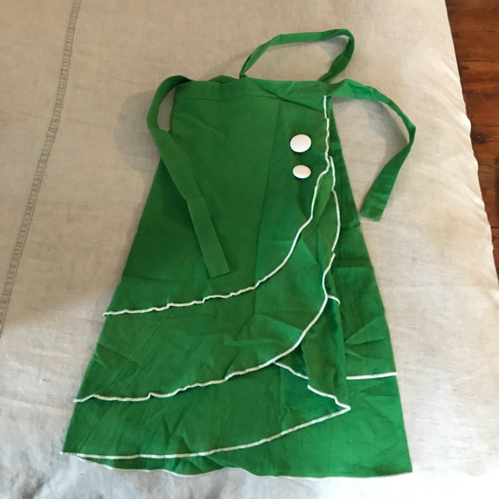 Lovely Bright green wrap skirt with button detail.